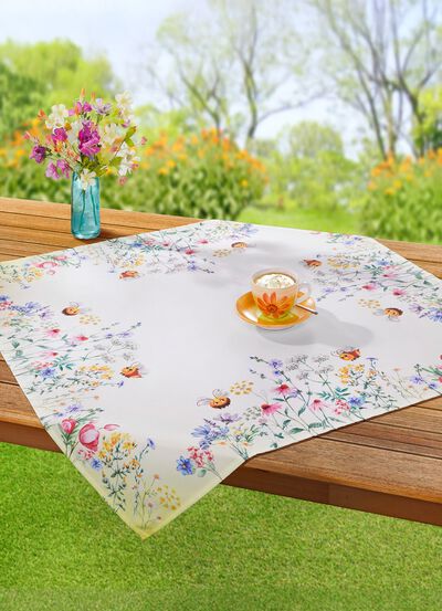 Tisch- und Raumdekoration mit farbenfrohen Bienen- und Blütenmotiven 