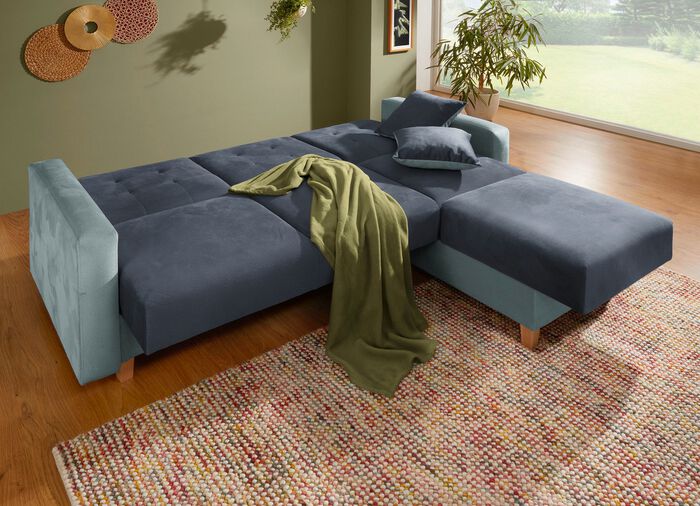 Polsterecke mit Bettfunktion und 2 Dekokissem 