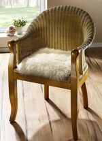 Merino-Lammfell-Sitzauflage in Tierform 