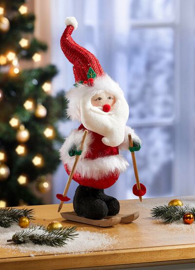 Weihnachtsmann auf Skiern 