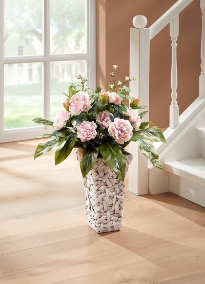 Bauernrosen in Wasserhyazinthen-Korb 